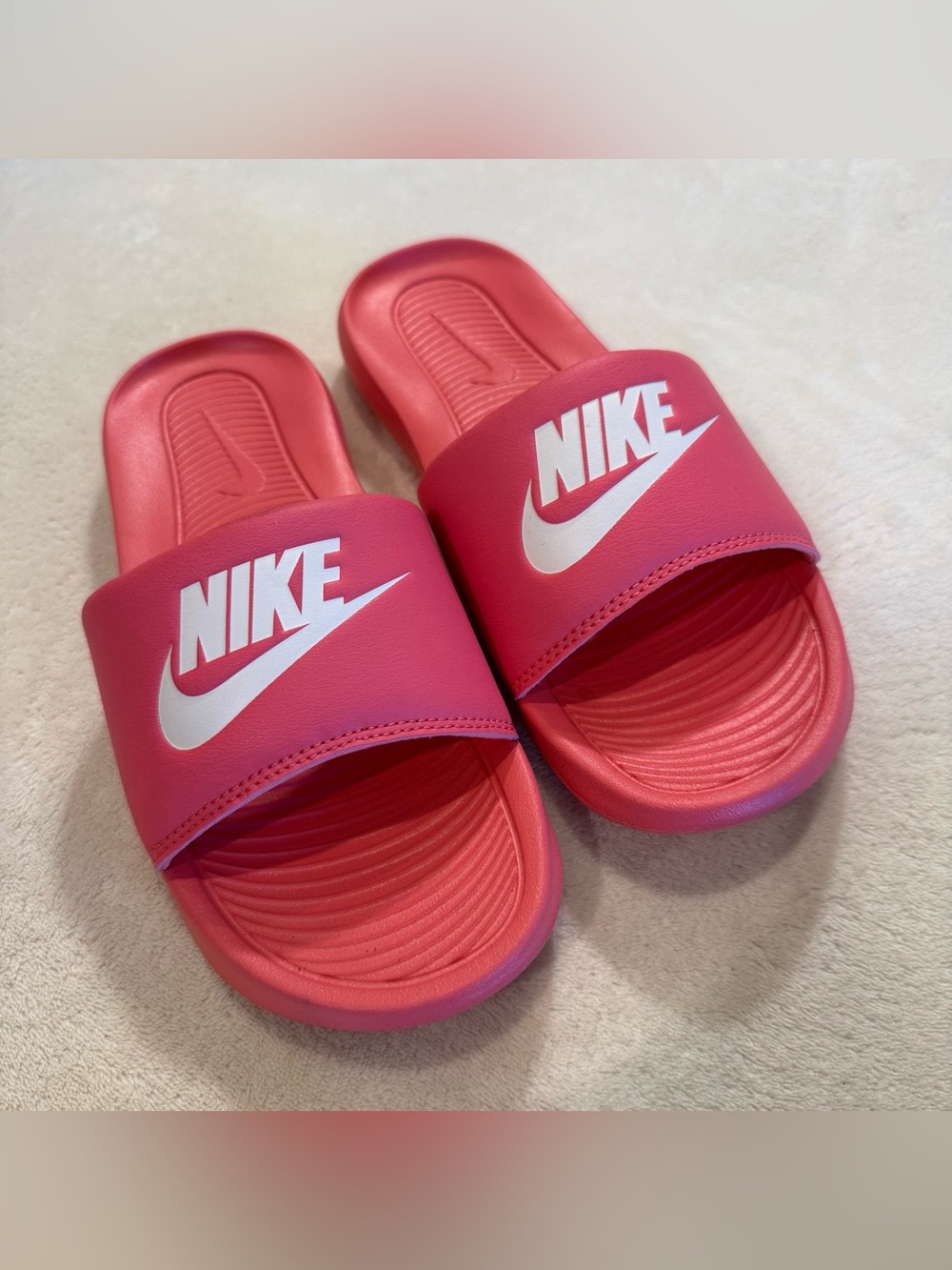 Nike Pink Slide Sandals with White Logo